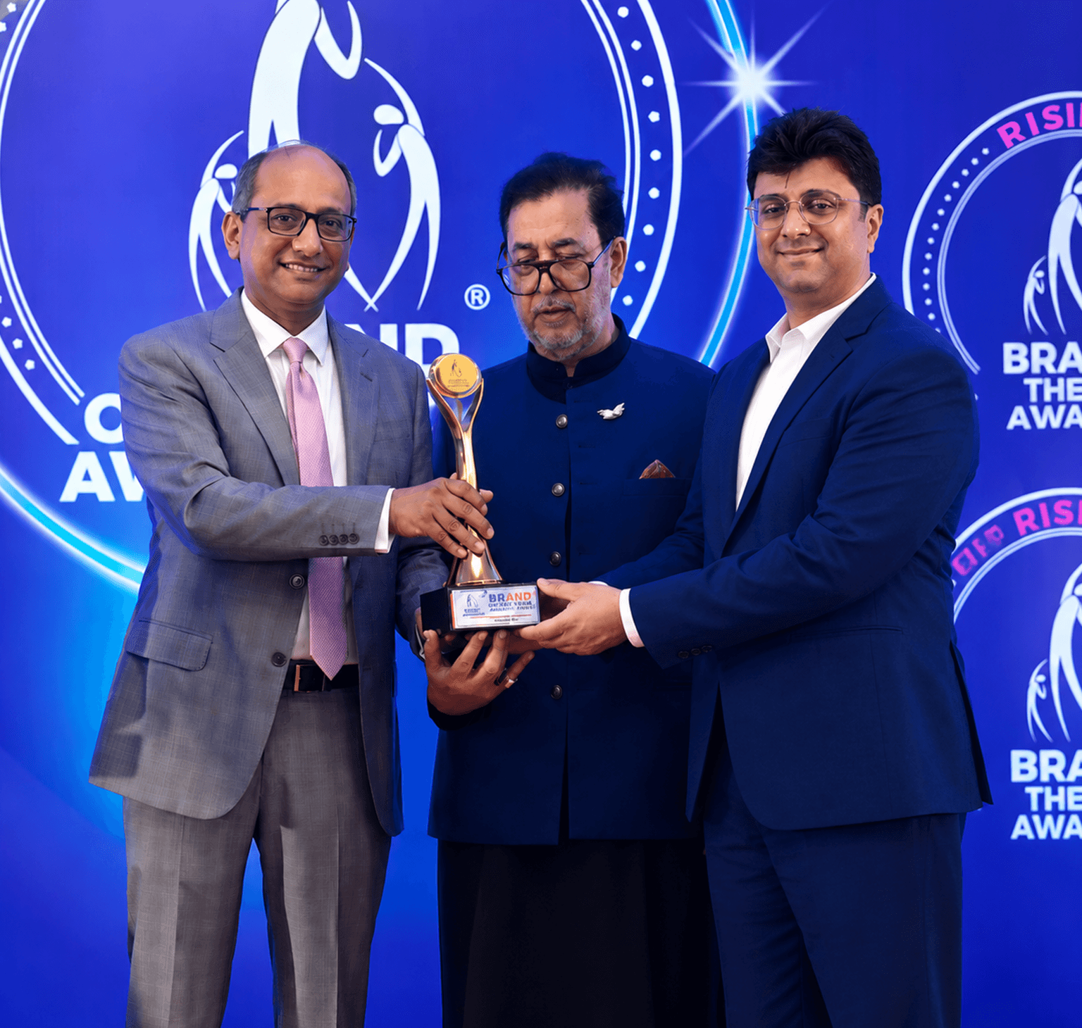 Ambassador CEO receiving the Brand of the Year Award